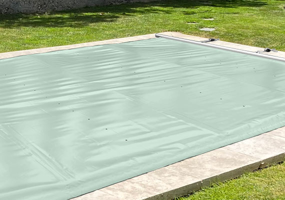 Couverture de sécurité à barres invisibles pour piscine Aquilon coloris Vert Amande